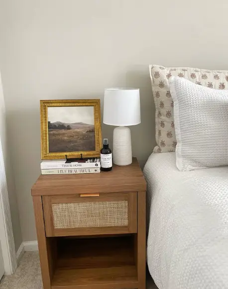 Styled bedroom nightstand with drawers keeping the surface clean and clutter free