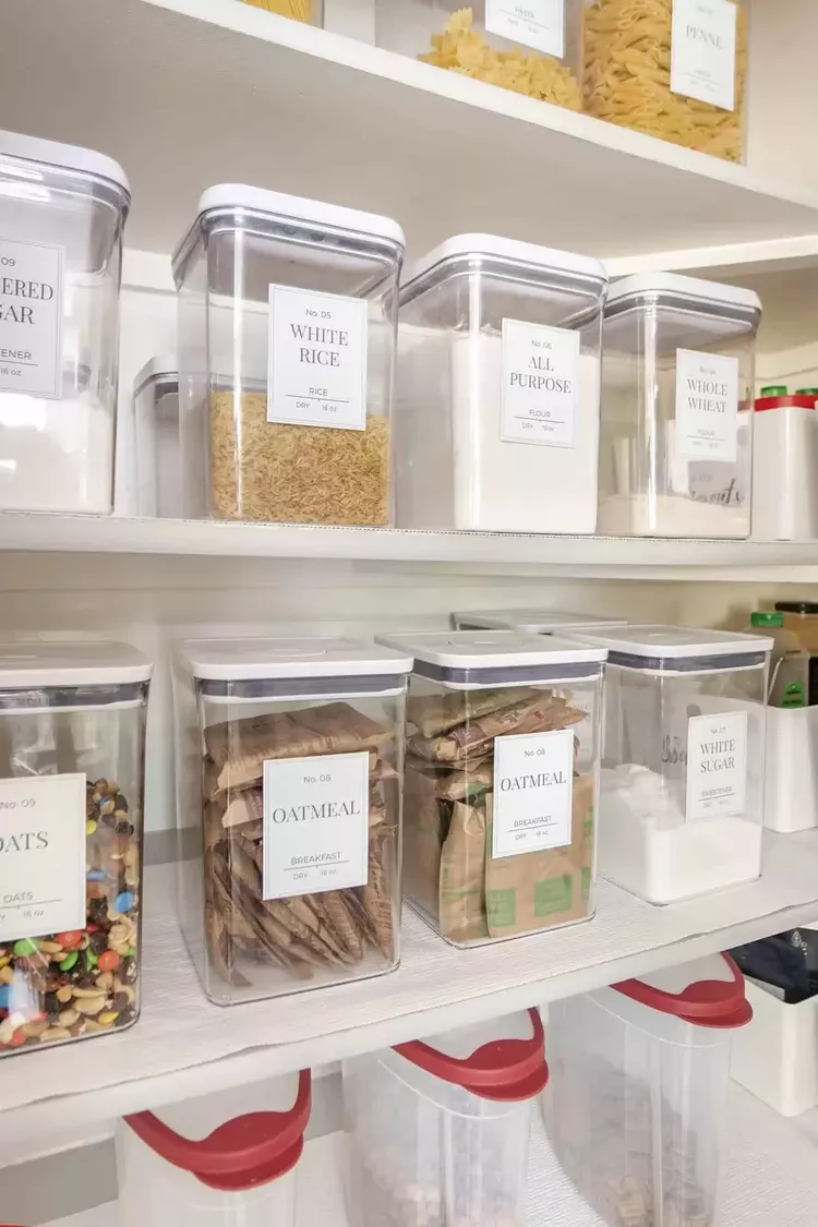 Small pantry with matching clear storage containers for dry goods