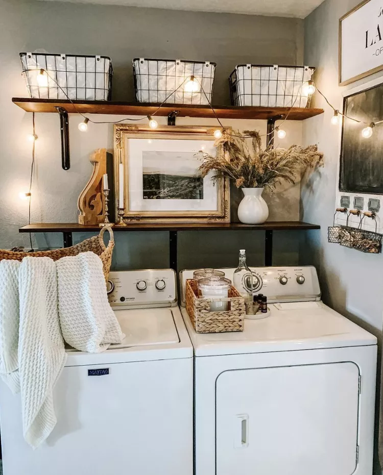 Styled small laundry room overview with baskets shelves and neutral decor